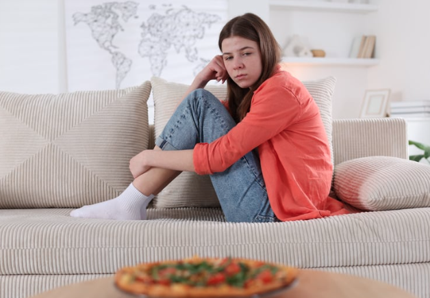 Child internalizing picky eater label during parent conversation.